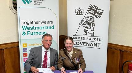 Cllr Brook and Major Henry signing the Covenant