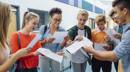 A group of students looking at their exam results