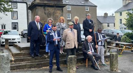 The official party on the steps of the Obelisk in Broughton in Furness