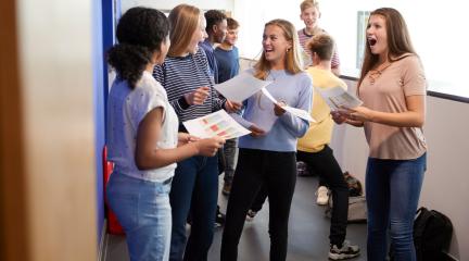 A group of students looking at their exam results