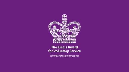 The King's Award for Voluntary Service emblem.