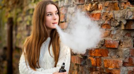 young person with an e-cigarette