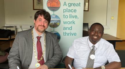 Cllr Matt Severn and Cllr Ali Jama signing their Chair and Deputy Chair declarations.