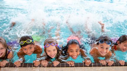 Kids swimming in a pool