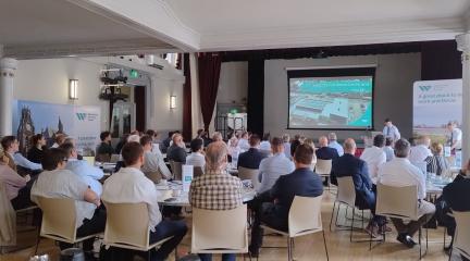room of suppliers viewing a presentation