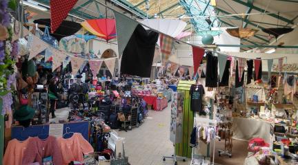 Stalls in an indoor market.