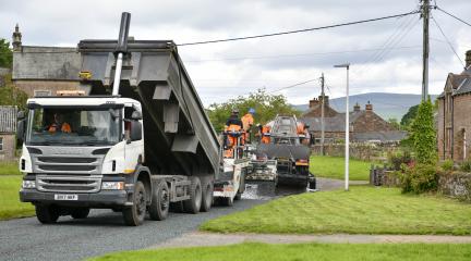 Road resurfacing being carried out on a rural road
