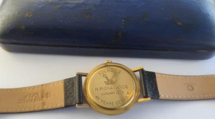 An engraved watch and case