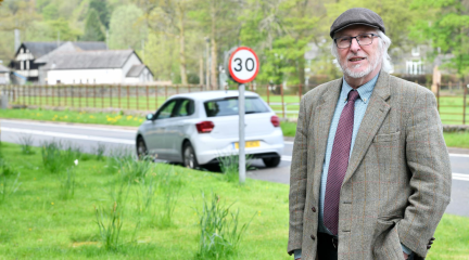 Cllr Peter Thornton, Cabinet Member for Highways and ICT stood on a Patterdale Road that was included in year one of the 20mph programme.