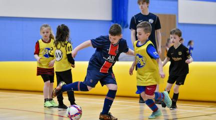 Kids playing football
