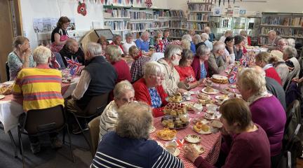 People enjoying a VE Day lunch at Shap Old Courthouse