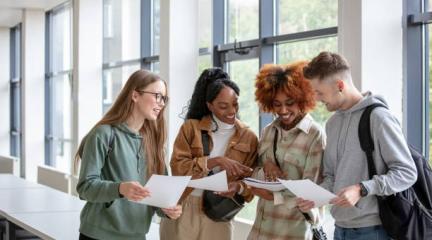 students opening results inside a school