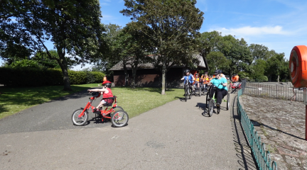 People using accessible cycles
