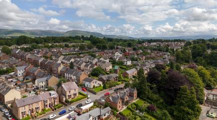 Rows of houses in Penrith with a bright blue sky