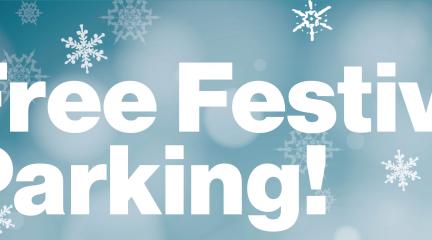 A sign saying "Free Christmas parking."