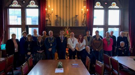 Veterans and civic guests at the Chairman's festive gathering in Barrow Town Hall