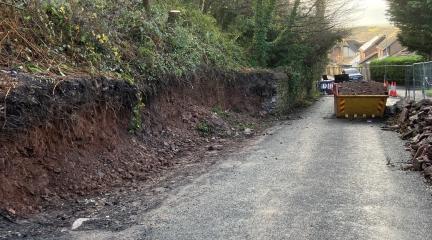The site at Ormsgill Lane where the retaining wall partially collapsed.  