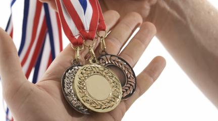 Olympic sports medals hands