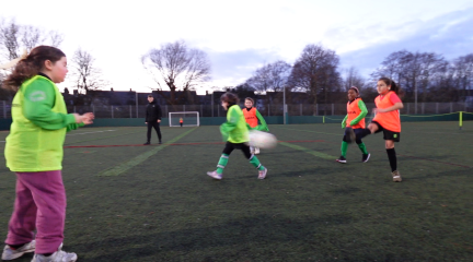 Girls playing football in Barrow