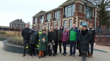 Members of Save Grange Lido and council officers and members on a site visit at Grange Lido.