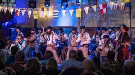 Sea shanty performers on stage at Barrow Town Hall