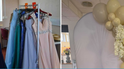 prom dresses on hangers and the balloon arch