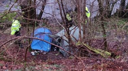 Illegal campsite set up on the shores of Ullswater in a woodland