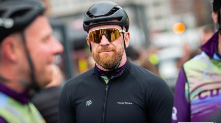 Sir Bradley Wiggins dressed in black cycling gear.