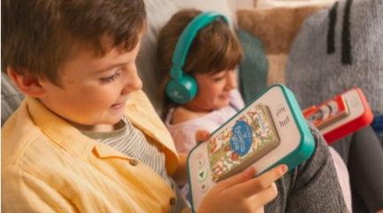 Two children listening to stories on the Voxblock audiobook player