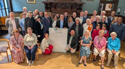 Group photograph from Faith Covenant signing in Kendal Town Hall
