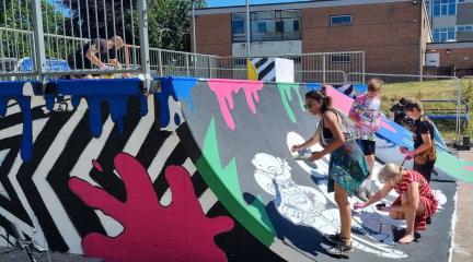 People creating street art at Penrith skate park