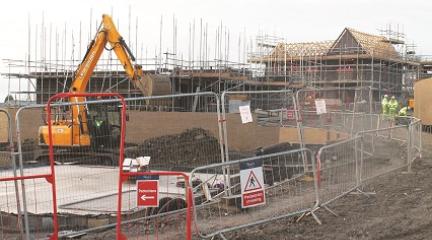 Machinery working on a building site for a new housing development