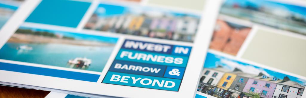 Leaflets on a table, saying "Invest in Furness."