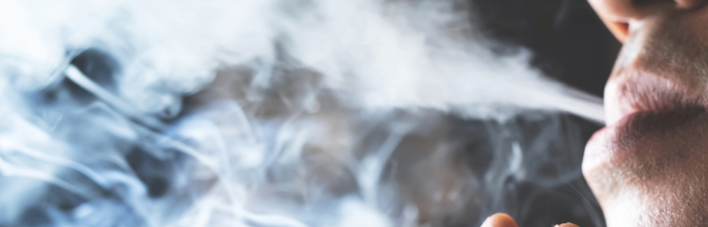 A person smoking a cigarette