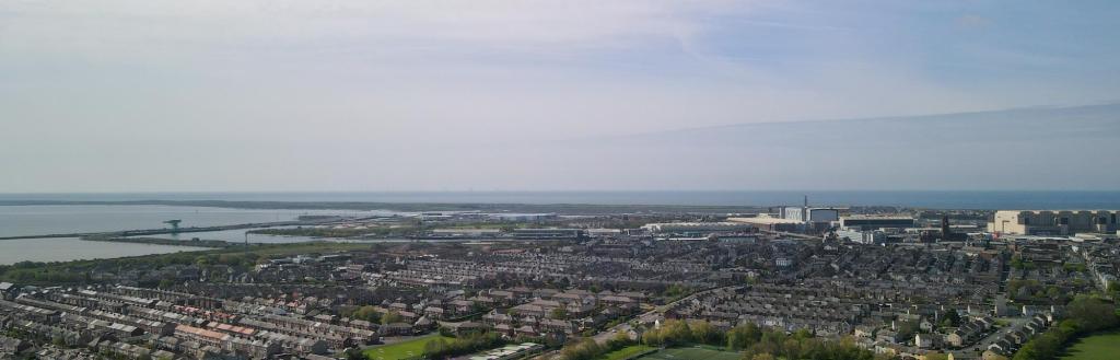 Drone image of Barrow in Furness with BAE Systems on the horizon