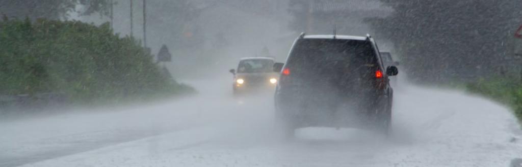 Cars on road in bad weather