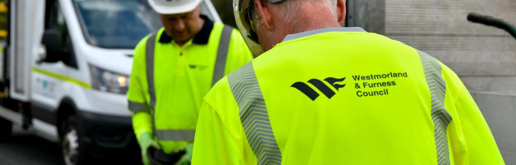 highways staff working on a road