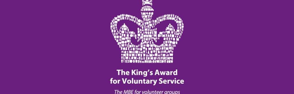 The King's Award for Voluntary Service emblem.