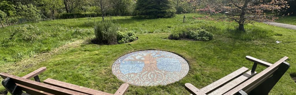 Tree of life mosaic and benches in Barrow Park
