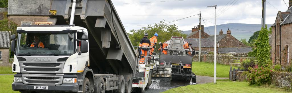 Road resurfacing being carried out on a rural road