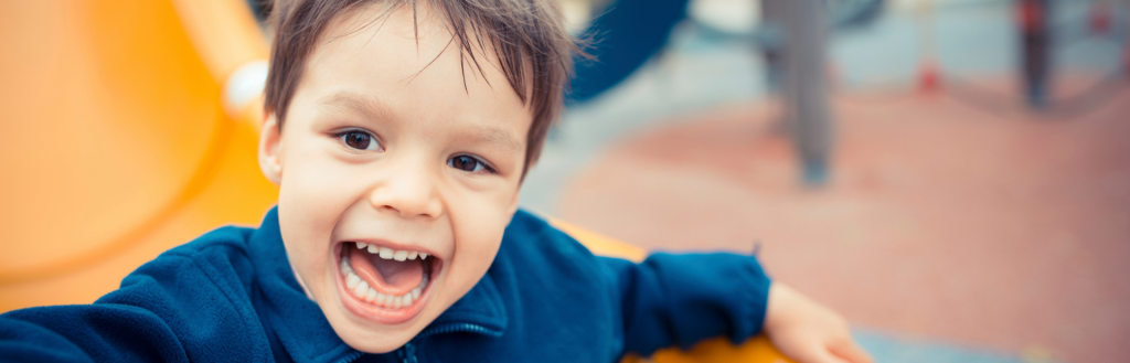 A kid playing at a playground