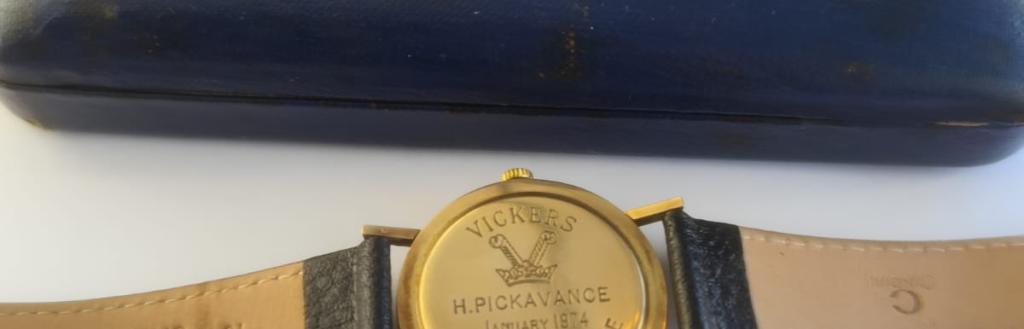 An engraved watch and case