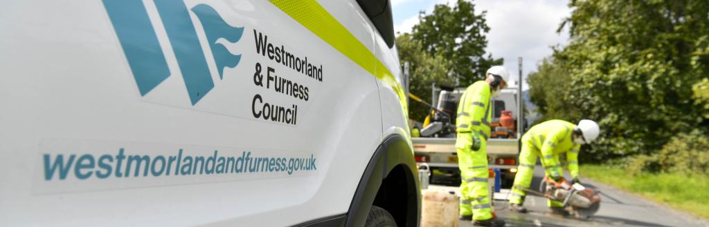 An image of Westmorland and Furness highways preparing a pothole to be repaired using a traditional method.