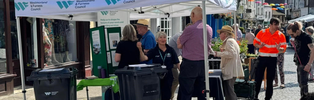 Residents chatting to the team at the Ulverston Market stall