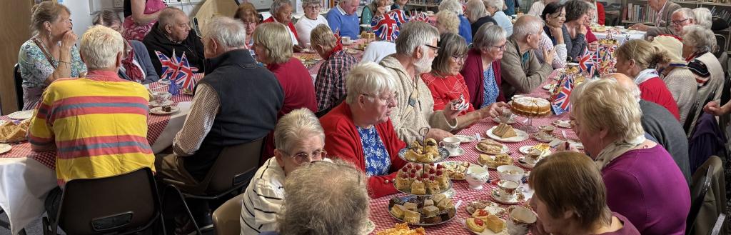 People enjoying a VE Day lunch at Shap Old Courthouse