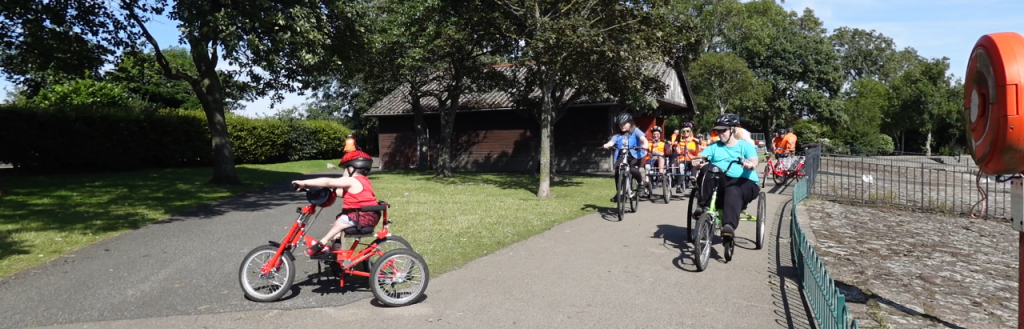 People using accessible cycles