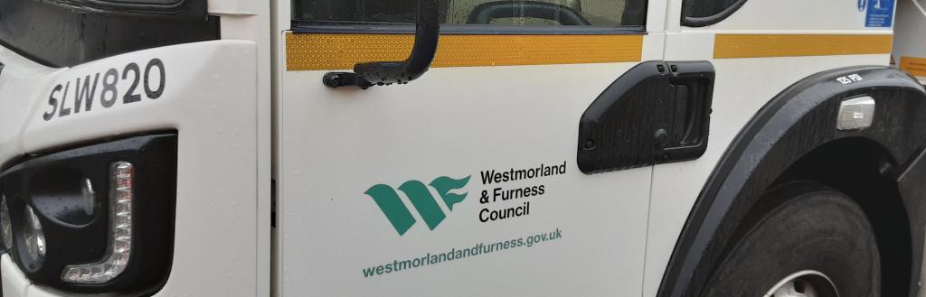 Picture of the side of a Westmorland and Furness bin wagon