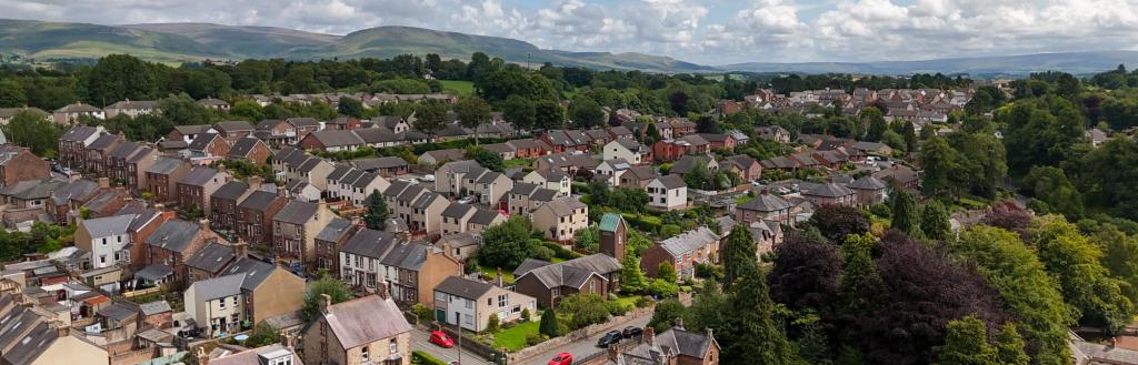 Rows of houses in Penrith with a bright blue sky