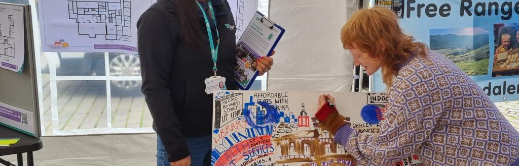 Penrith Town Hall Market Stall where an artist is transforming people's feedback into art.jpg
