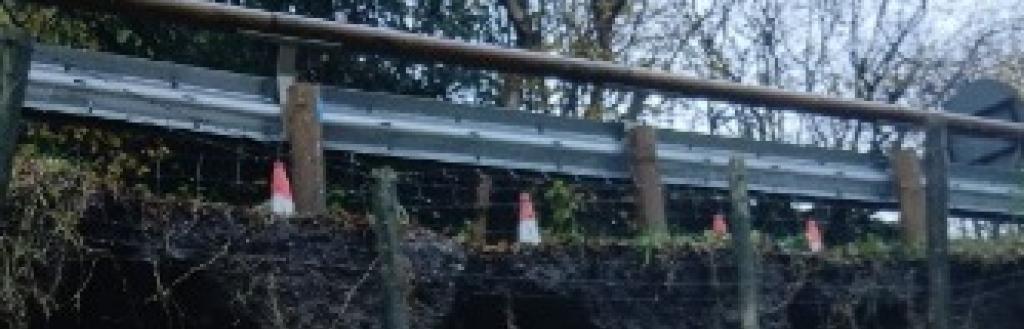 The section road with the landslip underneath.